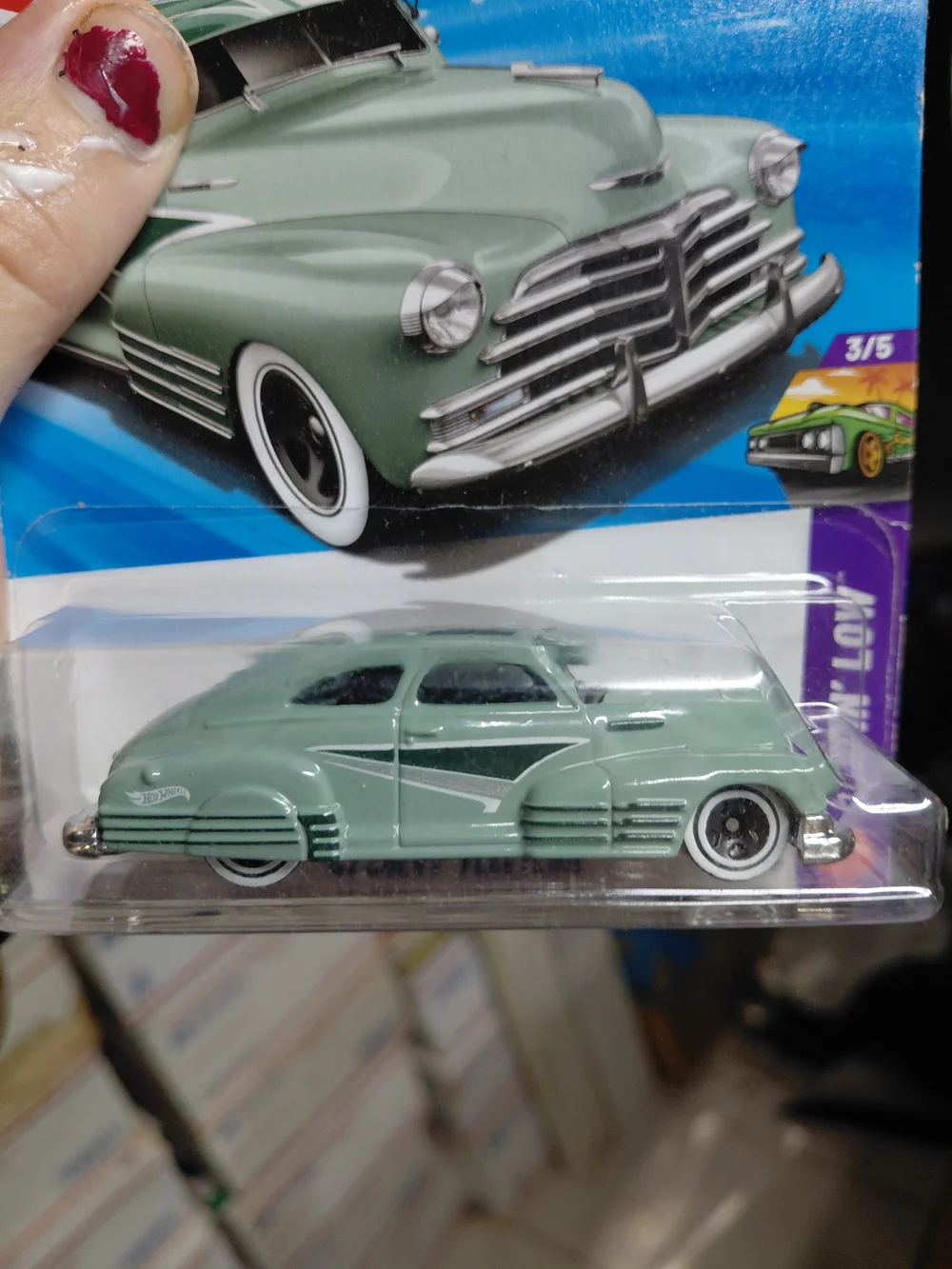 is the Hot Wheels '47 Chevy Fleetline in turquoise/green from the Layin' Low ser